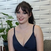 Smiling young woman with long dark hair